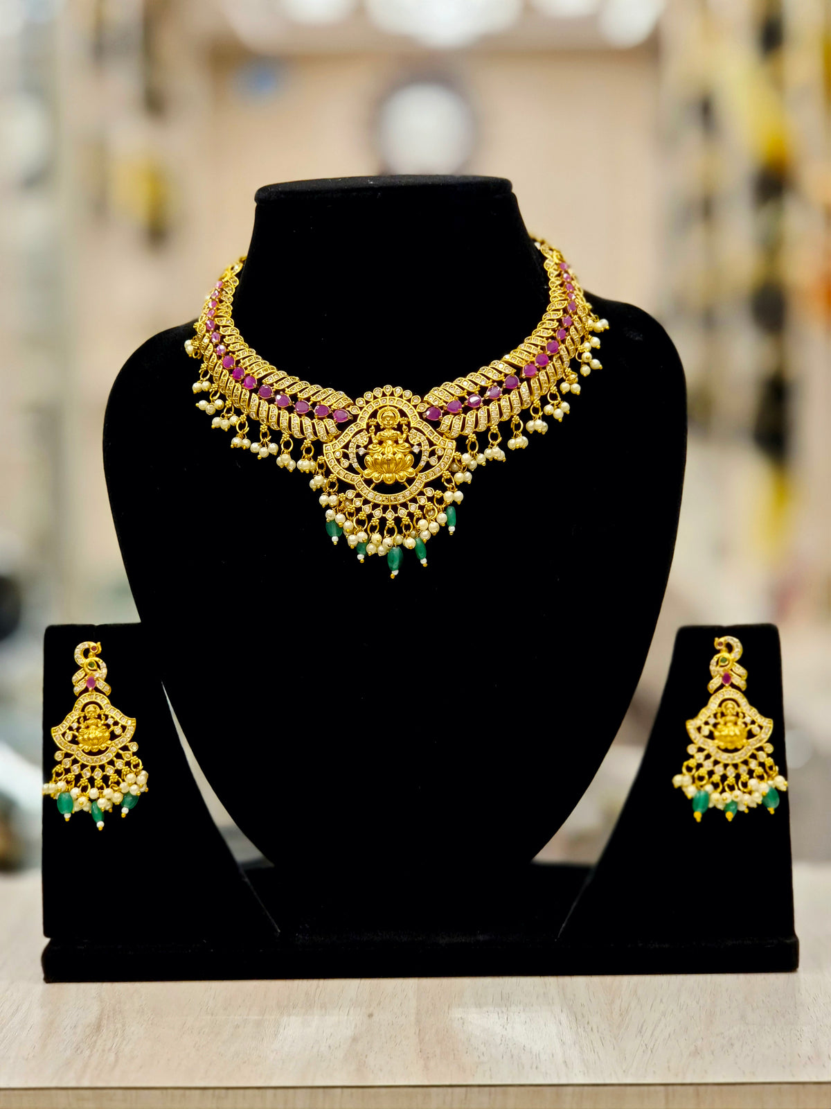 GOLD PLATED A.D AND TEMPLE NECKLACE WITH (maroon and green) STONES