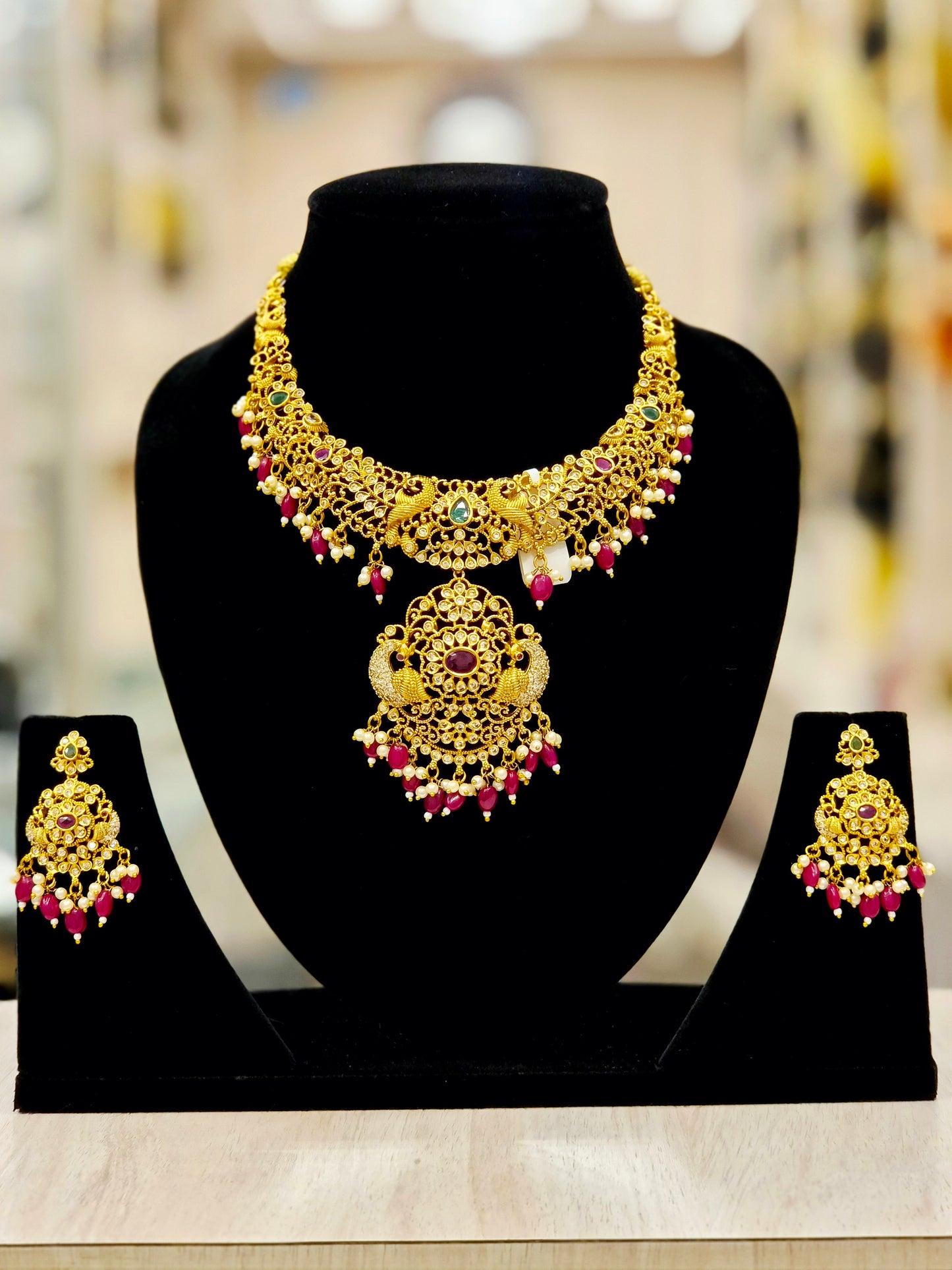GOLD PLATED TRADITIONAL A.D NECKLACE SET (red and green) PEACOCK DESIGN.