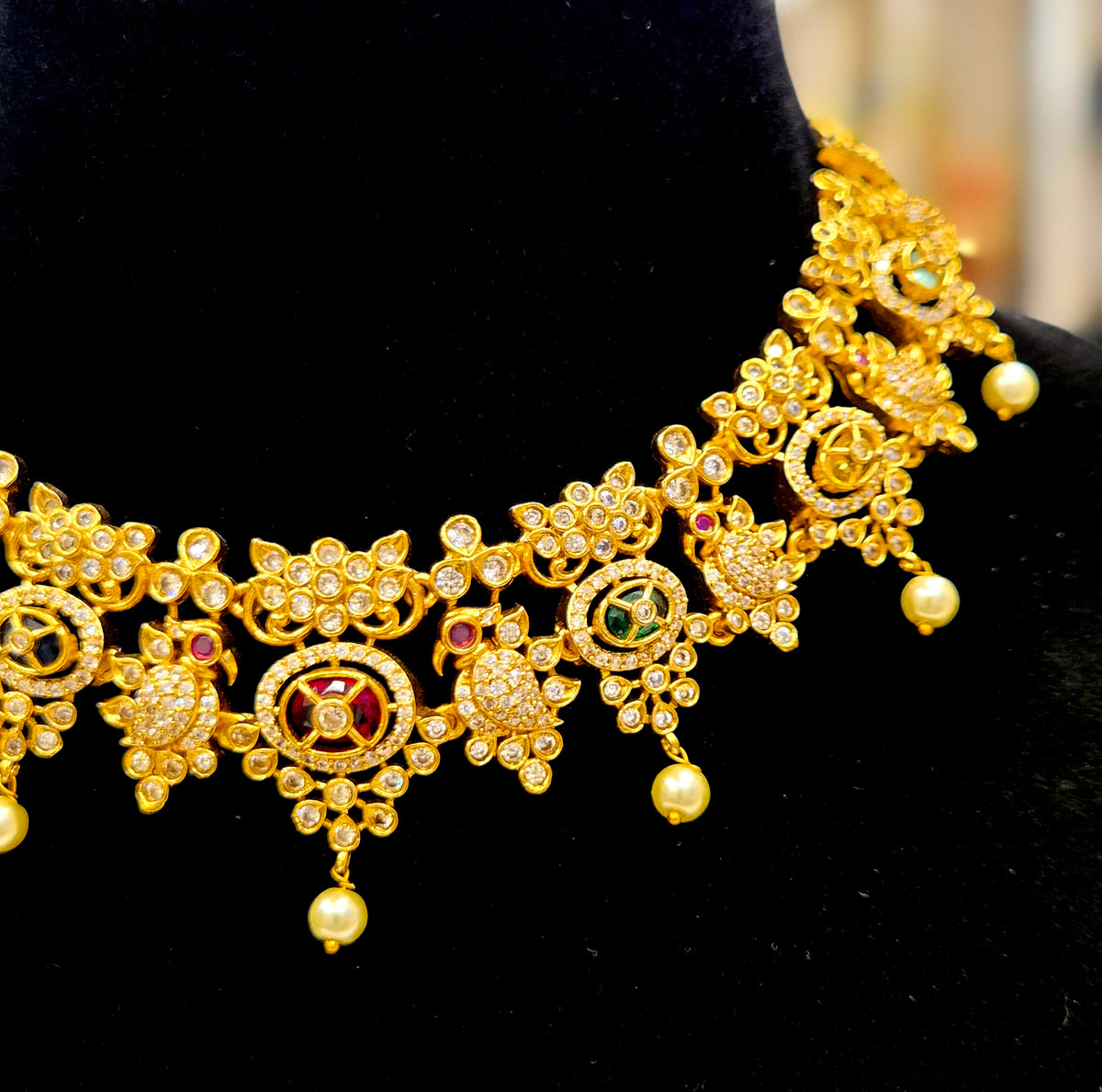 GOLD PLATED a.d necklace with bird sculpture (maroon and green)
