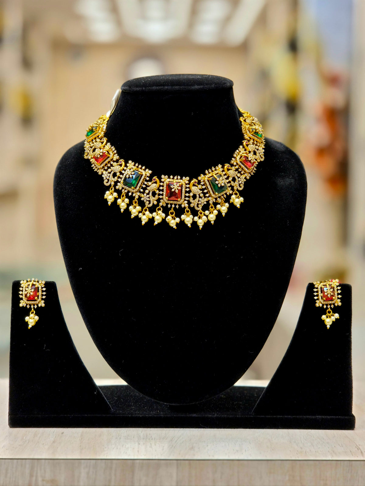A.D GOLD PLATED NECKLACE WITH RED AND GREEN PREMIUM STONES AND WHITE BEADS
